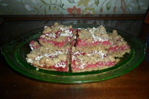 raspberry bars on a plate