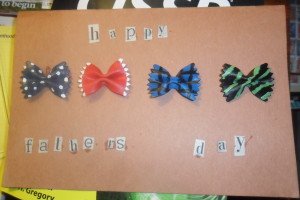 Painted bow tie pasta on a homemade card