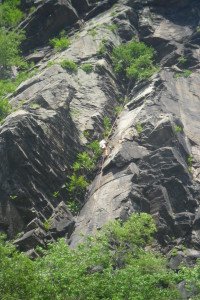 cliffs with guy rappelling