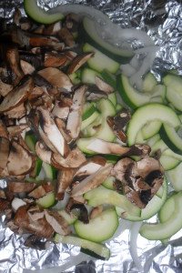 chopped mushroom and squash on onions