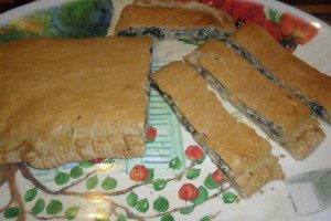 sliced calzone on platter