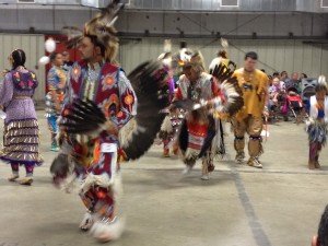 American Indians dancing in full dress