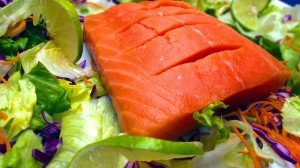 salmon on bed of greens