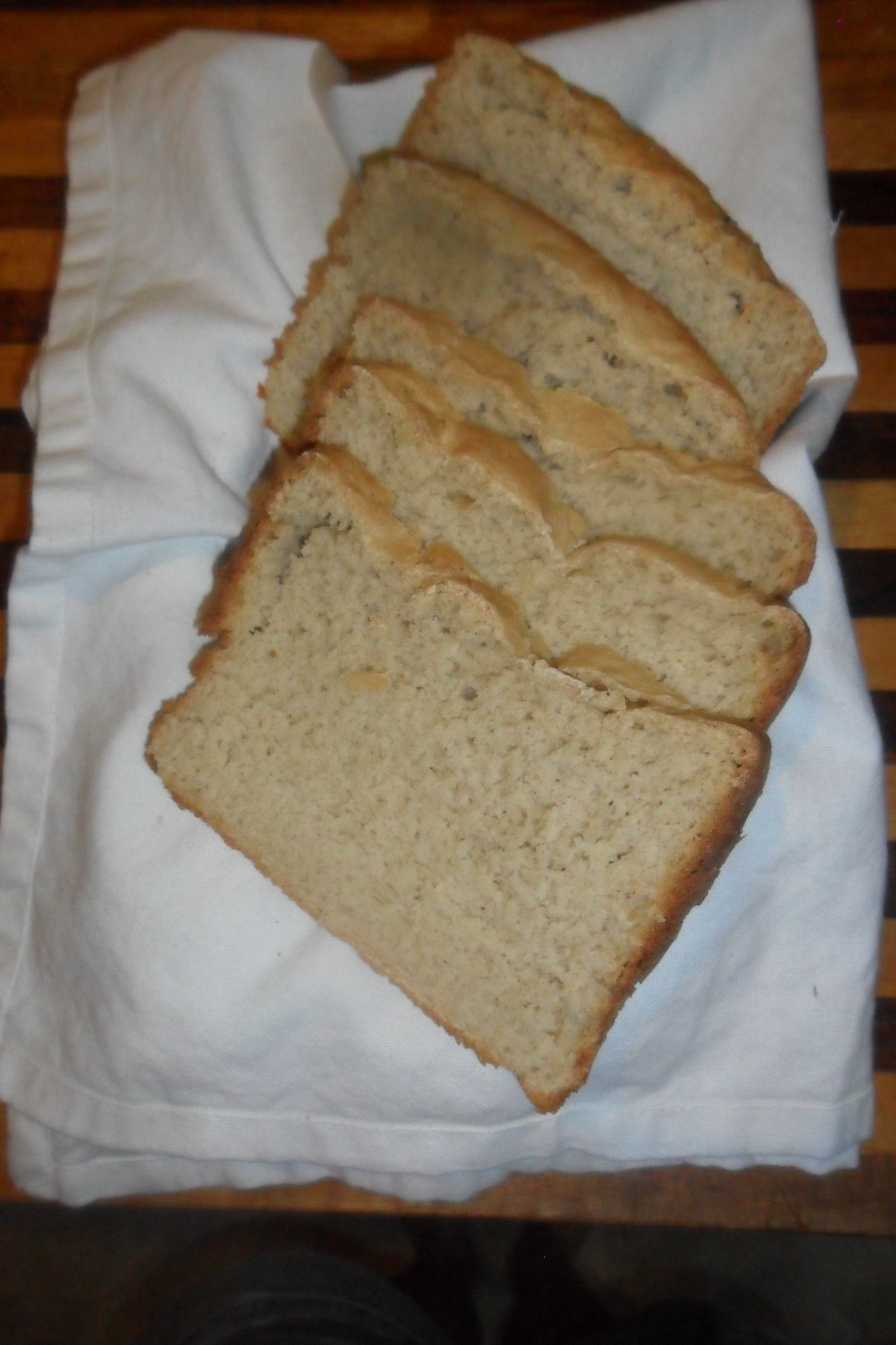 Bread basket with fresh, sliced garlic bread