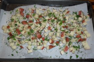 Pan covered with roasted potato ingredients