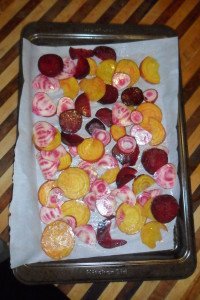 sliced yellow, red, and purple beets in a pan