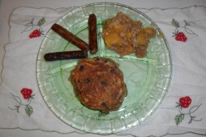 Breakfast arranged on plate with sausage