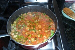 Okra simmering in the pan