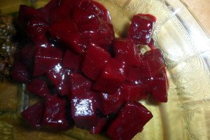 Glazed beets on plate