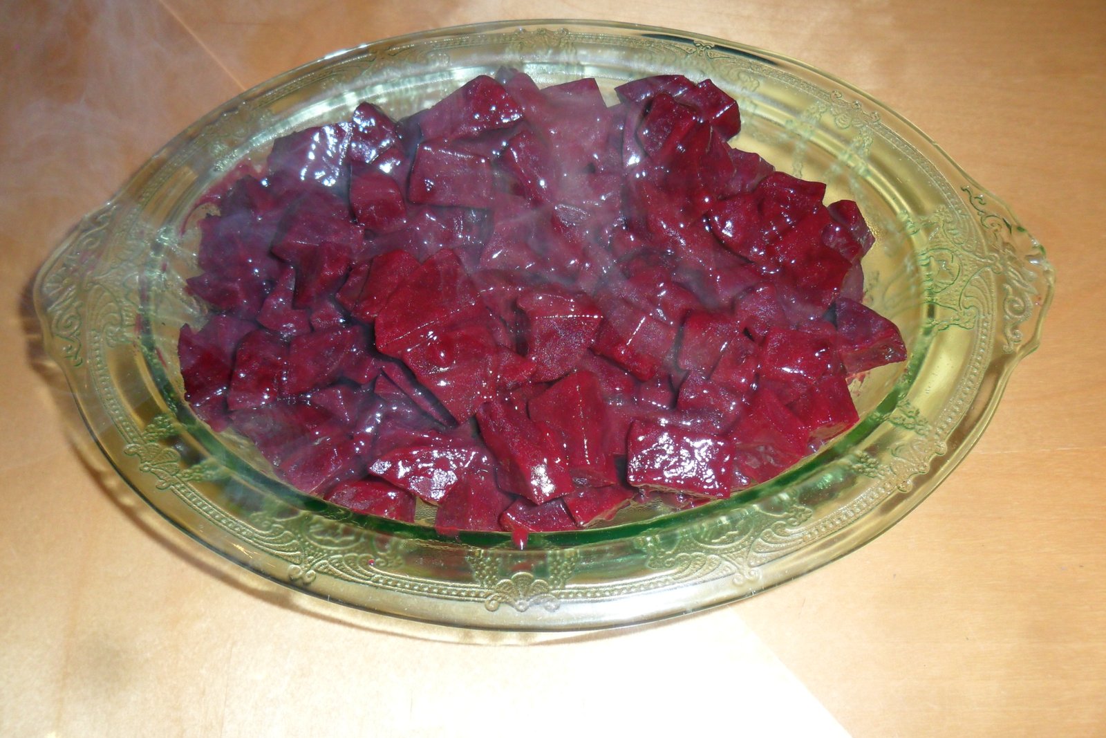 Steaming bowl of beets