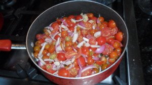 All tomato ingredients in a pan