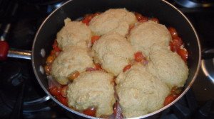 Eight biscuits top the tomato cobbler.