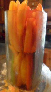 Peppers in the chute of the food processor.