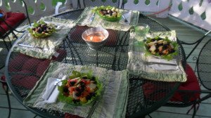 Outdoor table set for four with farm bowls