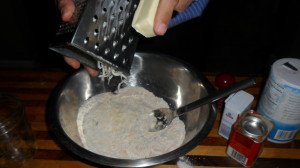 Grating the butter into the flour