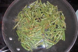 Beans cooking in the pan.