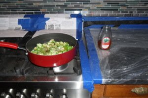 Brussels sprouts in pan and jar of local honey.