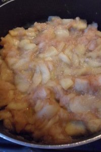 Applesauce cooking in pan