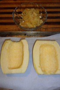 Halved and cleaned spaghetti squash ready to bake.