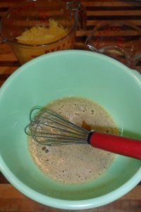 Mixing the bread ingredients.