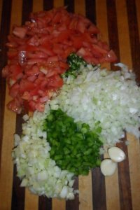 Colorful chopped vegetables piles.