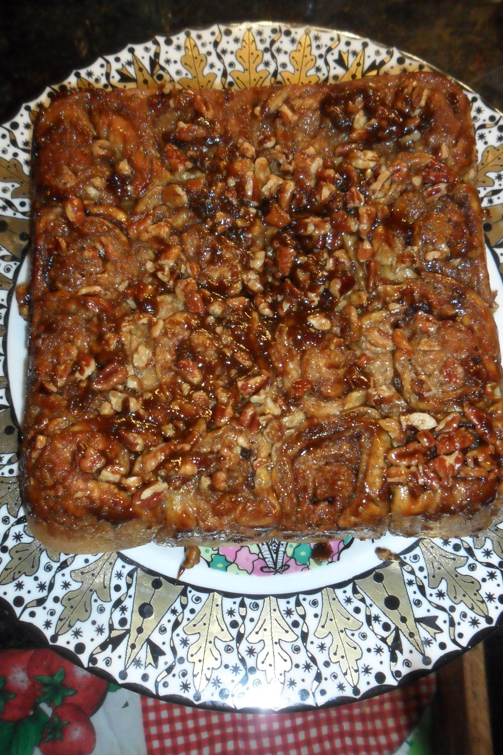 Inverted block of sticky buns on platter.