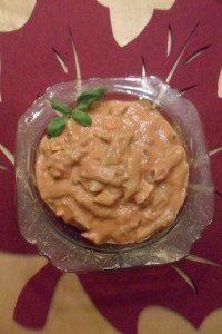 Salmon pasta in a bowl with basil