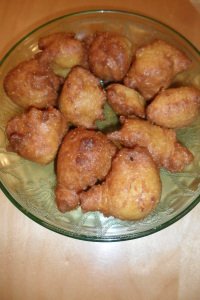 A serving bowl with yummy hushpuppies.