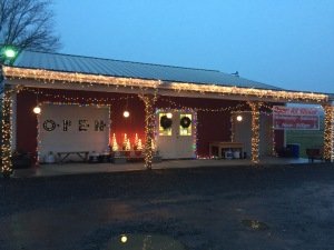 Very well decorated drive-up market/garage.