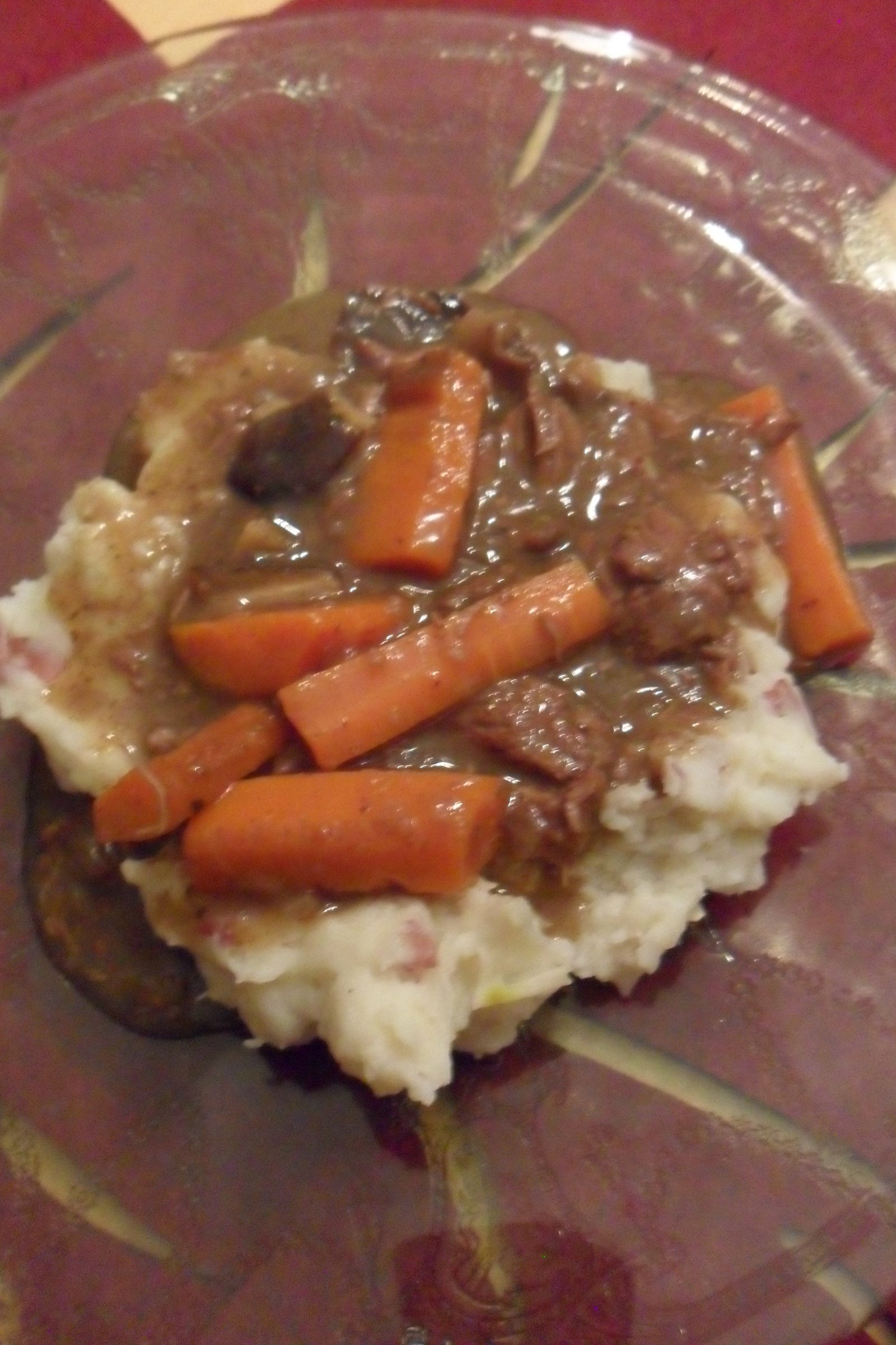 Serving carrot-intense beef marsala over potatoes.