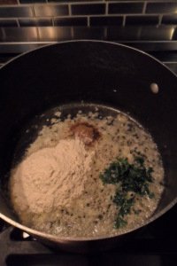 Adding flour, herbs, and spice to onion.