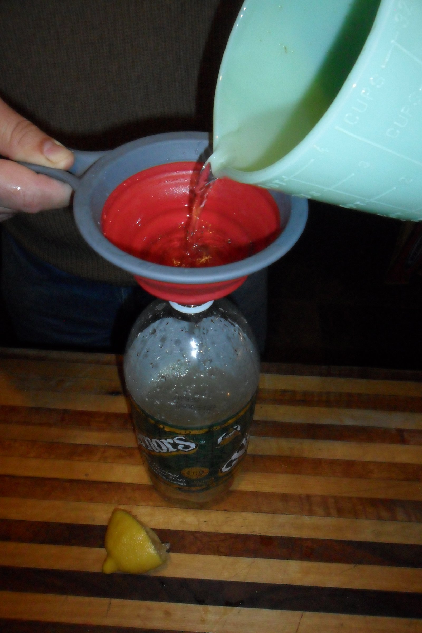 Using a funnel for the transfer.