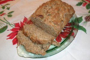 Sliced apple bread on platter.