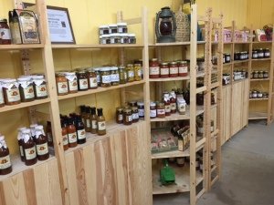 Shelves of jellies and sauces.