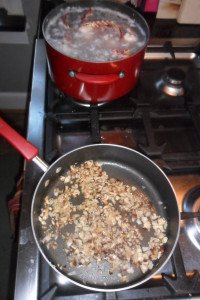 Cooking onions while lobster boils.