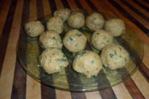 Rolled matzo balls ready to boil.