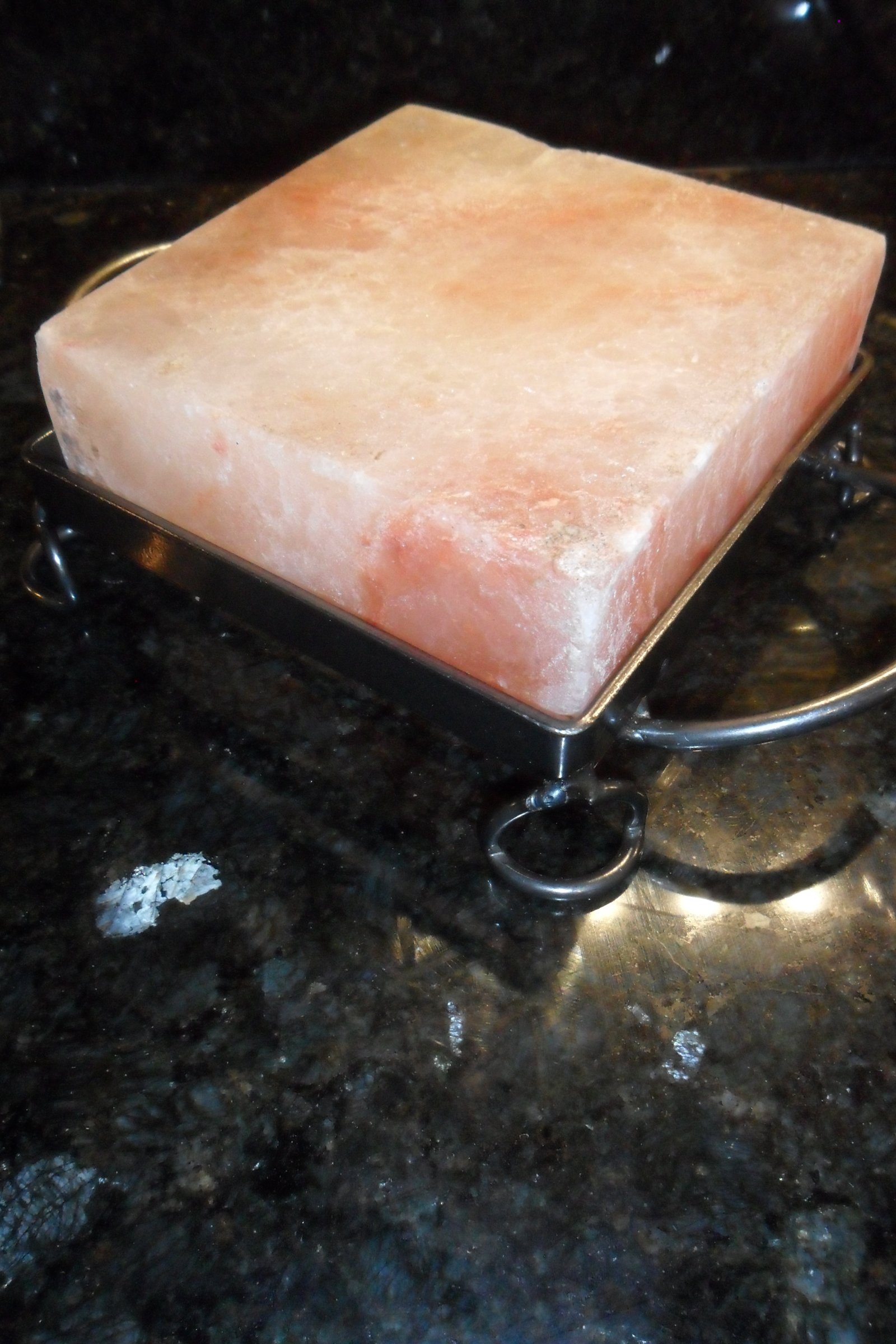 Himalayan salt block on rack.