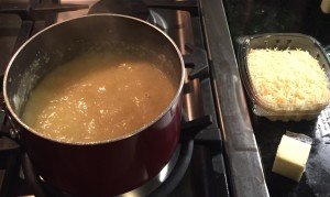 Stirring polenta before adding cheese and butter.