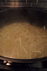 Boiling the noodles.