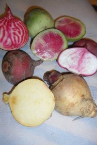 Four root vegetables cut in half.