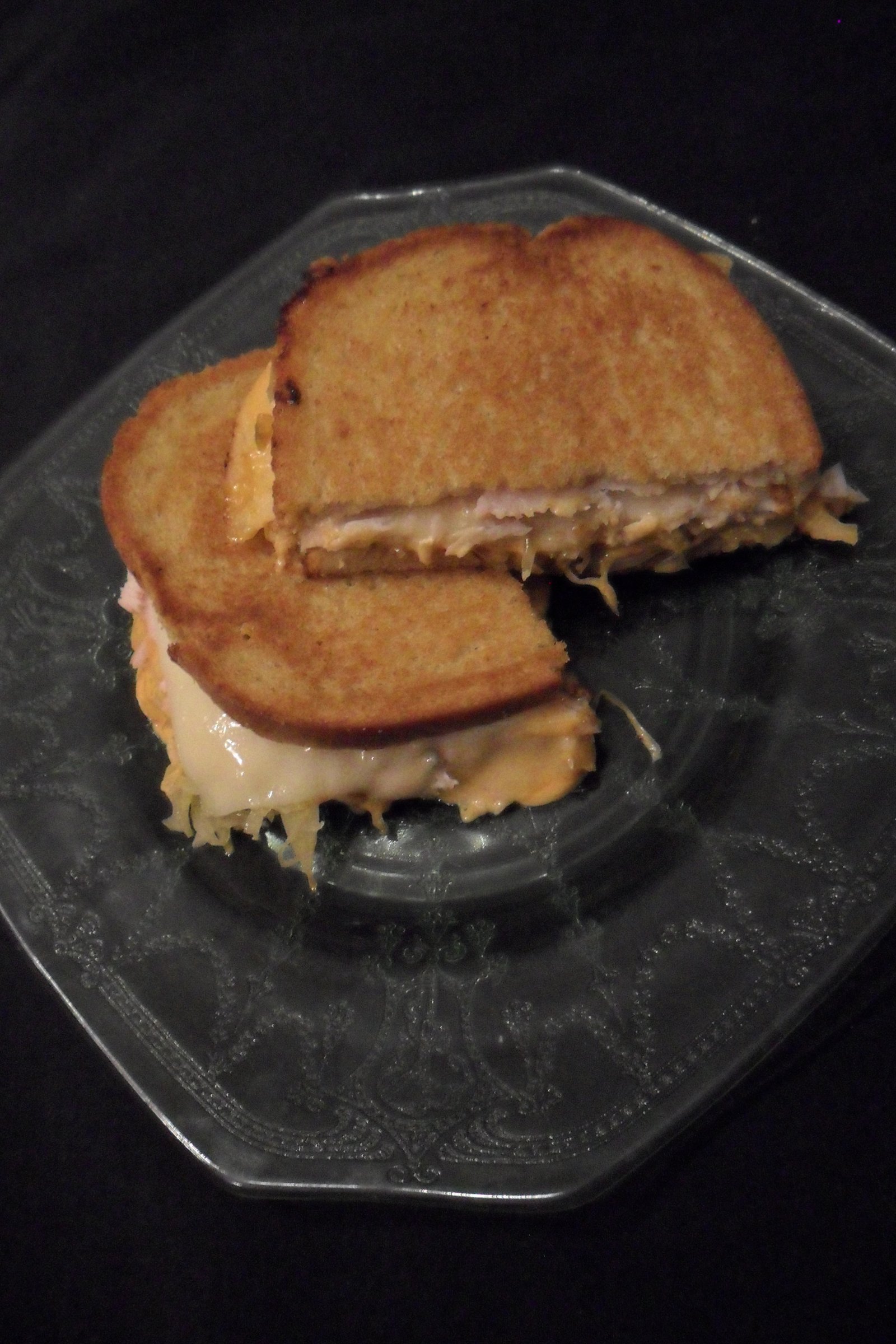 Serving the sandwich arranged on a plate.