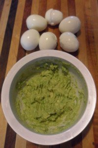 Peeled eggs and mashed avocado.