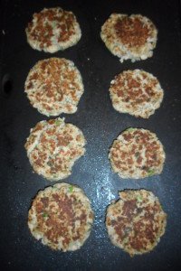 Browning patties on griddle.