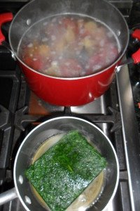 Boiling shells and cooking spinach.