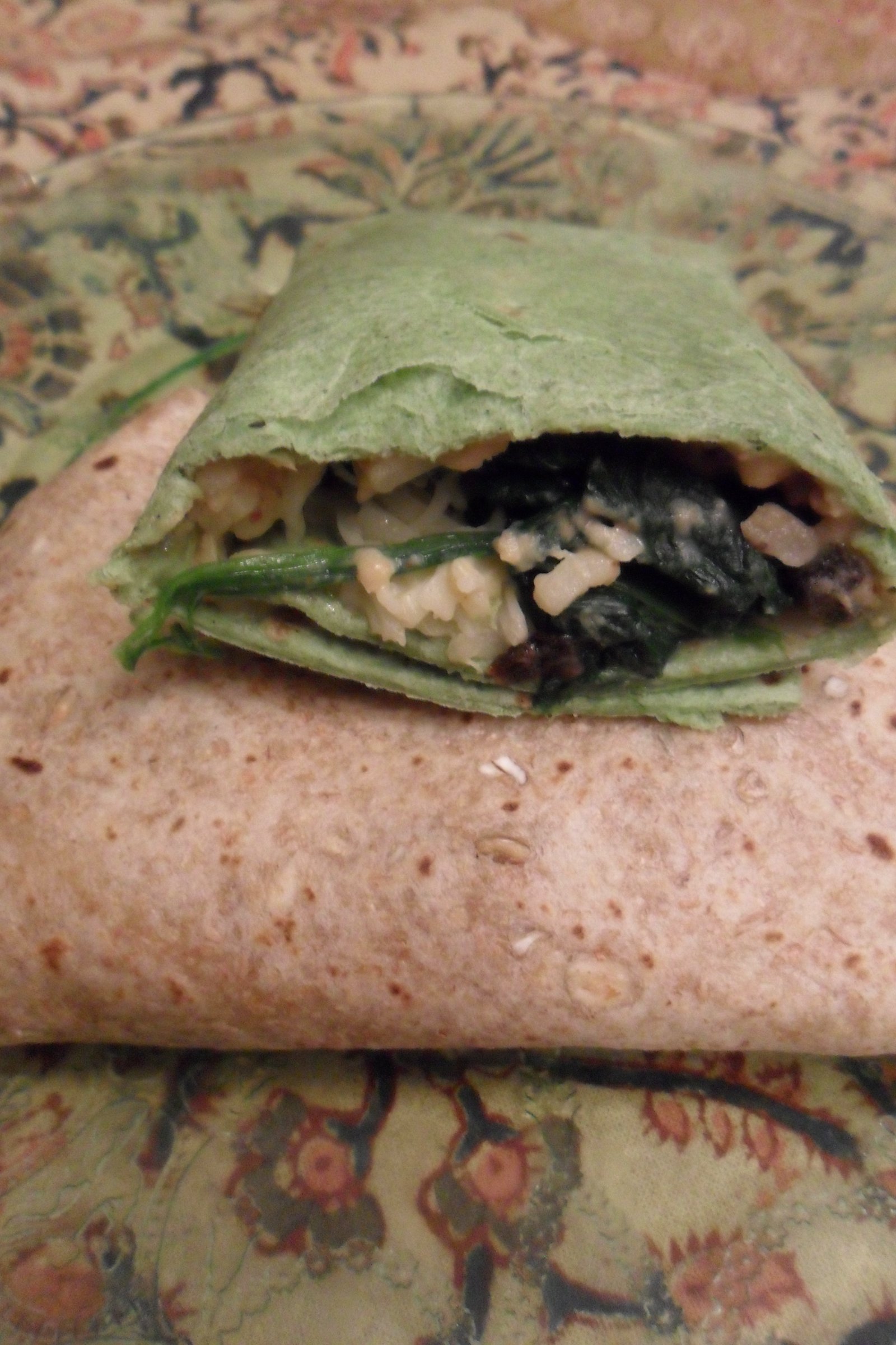 Showing inside of a wrap on serving plate.