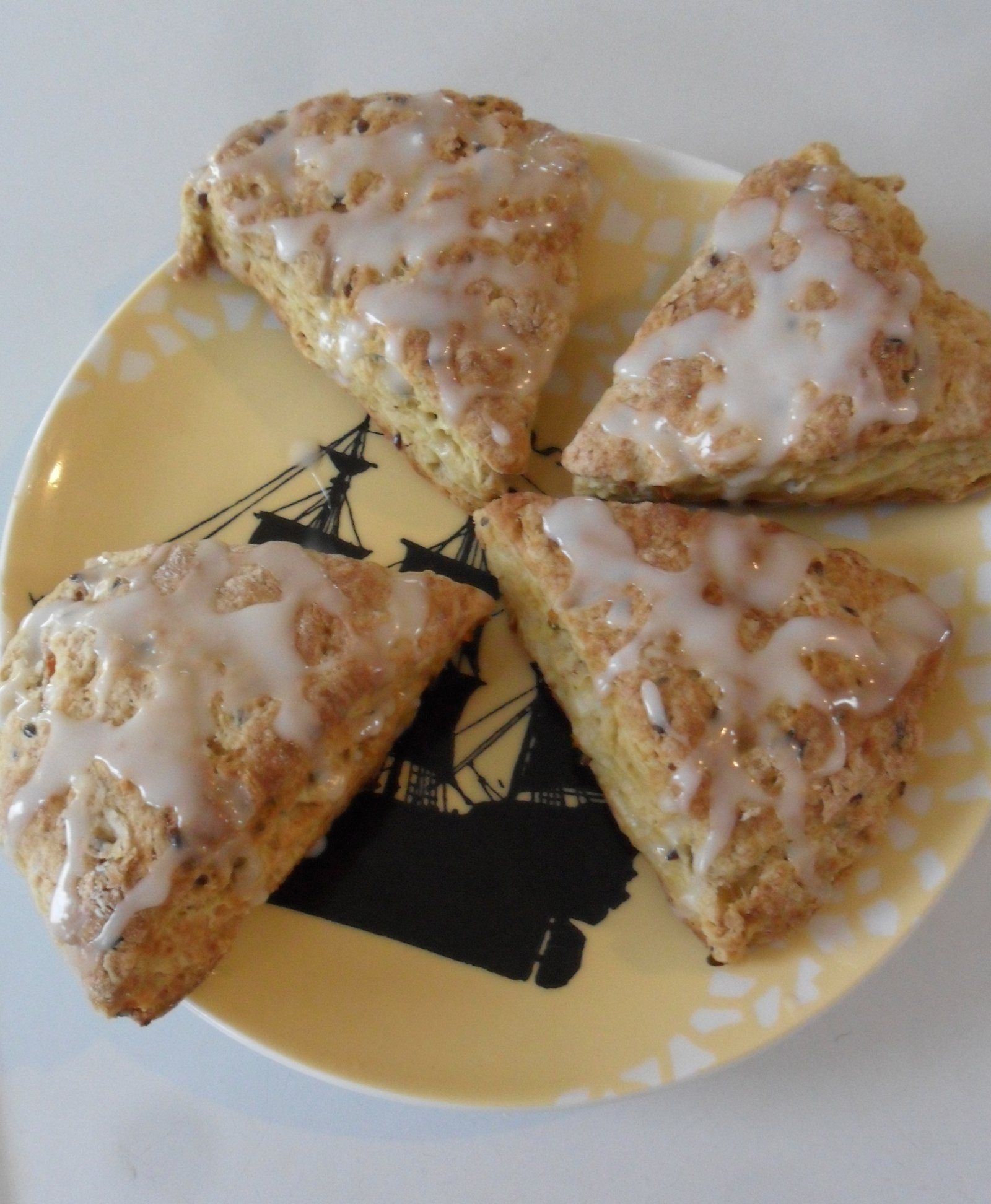 Serving glazed scones on a sailboat plate.