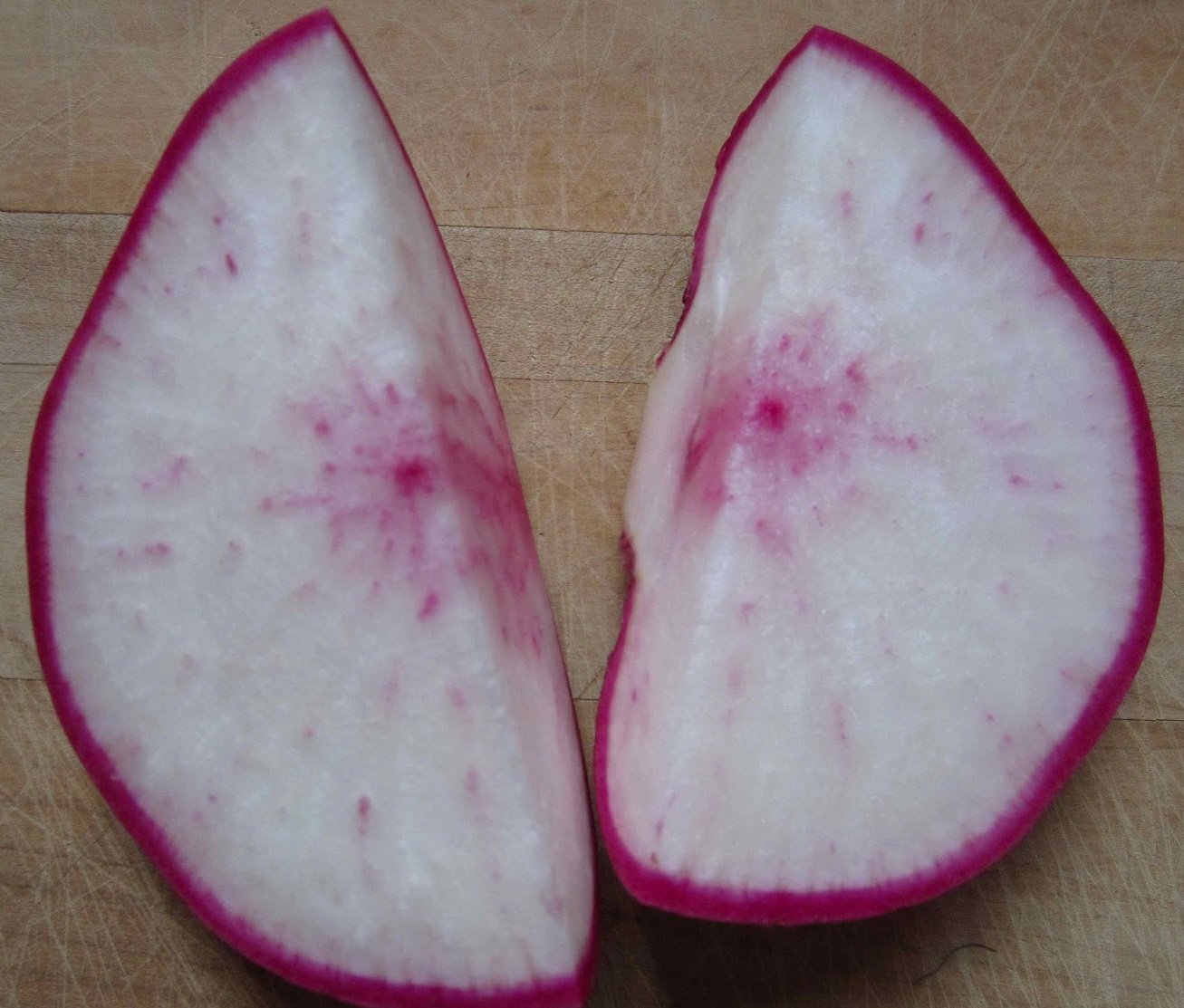 Scarlet queen turnip cut in quarters.