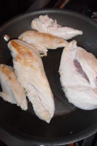 Cooking chicken breast.