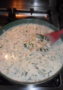 Stirring gnocchi into soup.