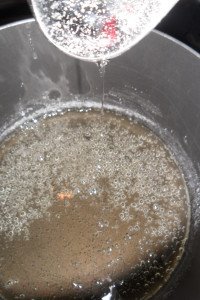 Cooking sugar and water syrup.